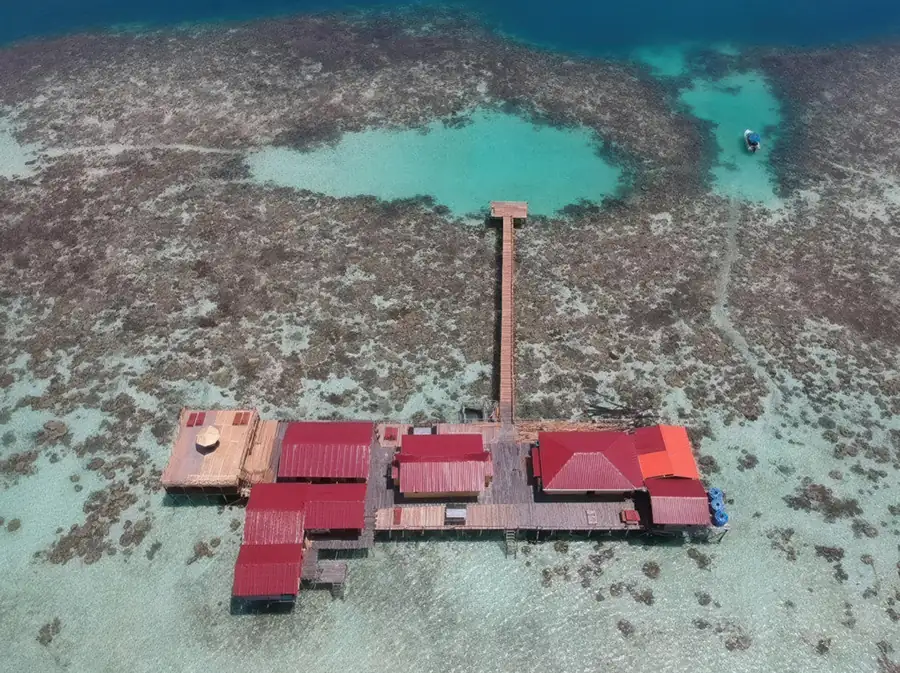 Aerial view of Egang Egang Resort overwater chalets near Bum Bum Island, Semporna
